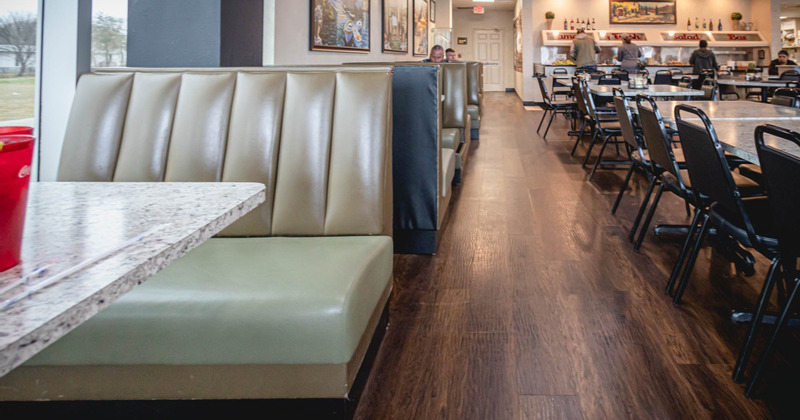 Interior, booths on the left and guest tables on the right