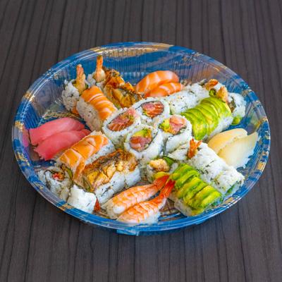 Assorted nigiri, sashimi, and rolls.