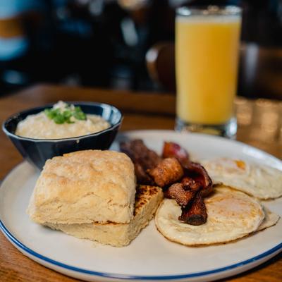 Texas country breakfast with orange juice.