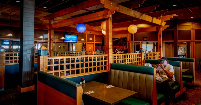 Interior of a restaurant with wooden booths