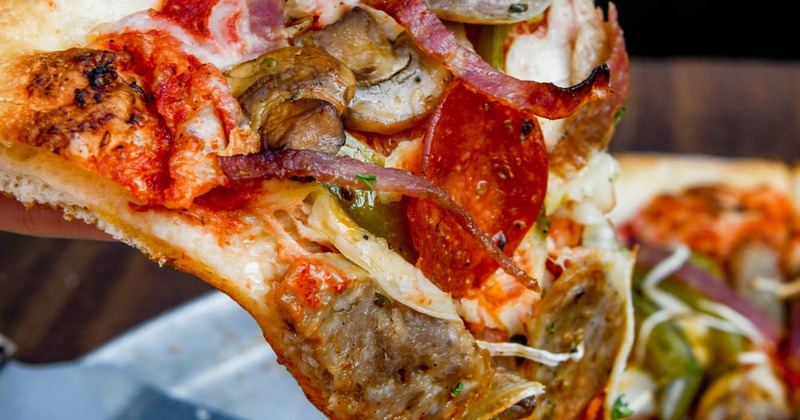 Slice of Deluxe pizza