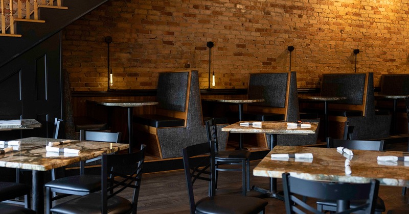 Restaurant interior, dining area with set tables