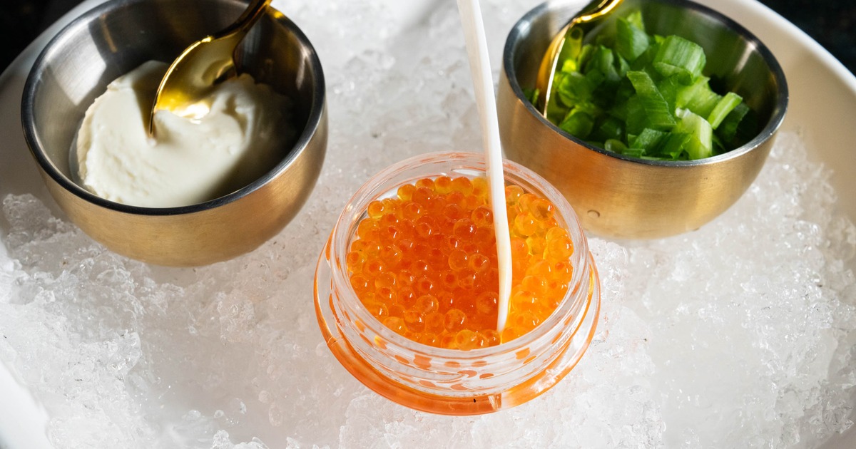 Caviar, scallions, and cream on ice