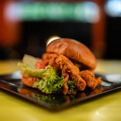 Fried Chicken Snadwich served with lettuce and tomato.