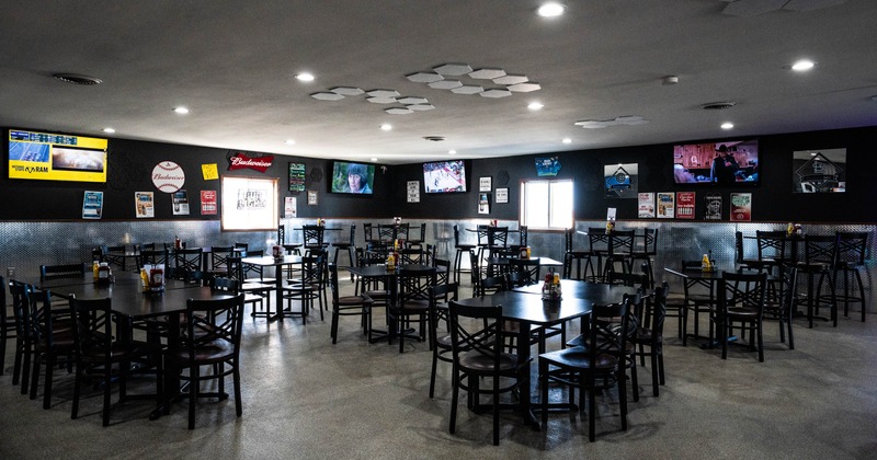 Interior seating area with chairs and tables
