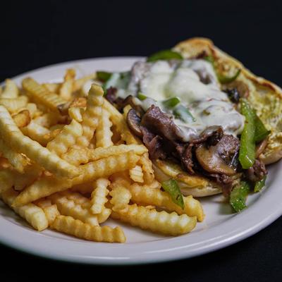 Philly Cheesesteak and a side of fries.