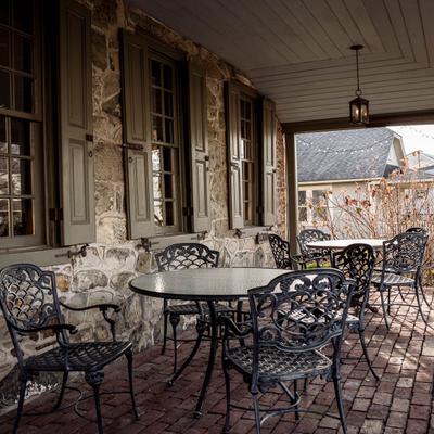 An exterior covered seating area.