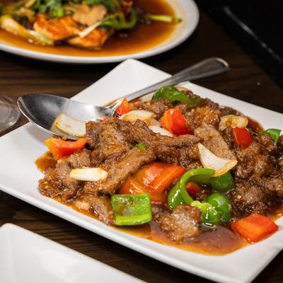 Pepper Steak with bell peppers, onion, mild garlic and brown sauce.
