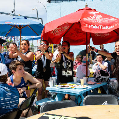Exterior, guests having fun, posing for a photo.