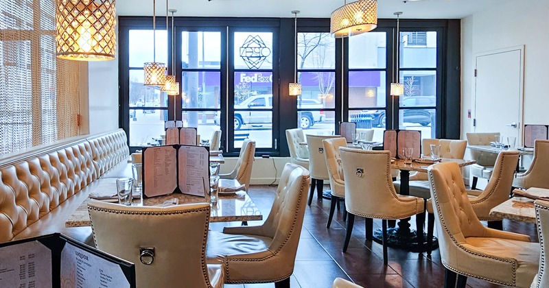 Interior, seating and dining area, white armchairs