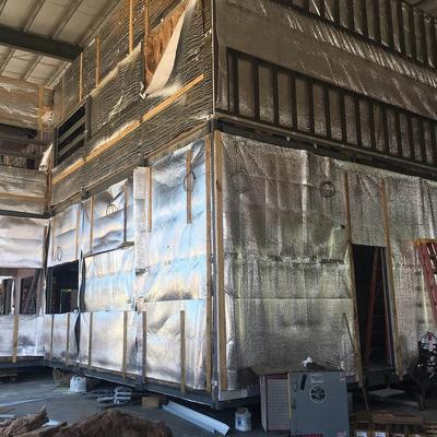 A building interior space is being built with aluminum sheets