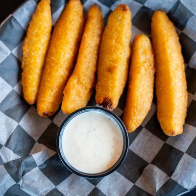 Fried pickle spears and dip.