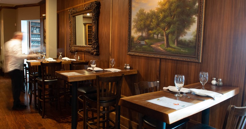 Interior, tables and chairs ready for guests
