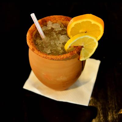 Cocktail in a clay cup.