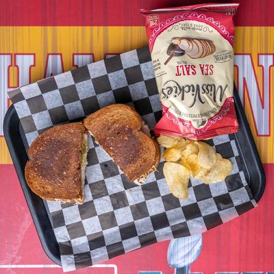 Grilled sandwich and chips.