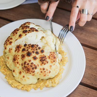 Woodfired cauliflower, on a bed of golden beet tahini