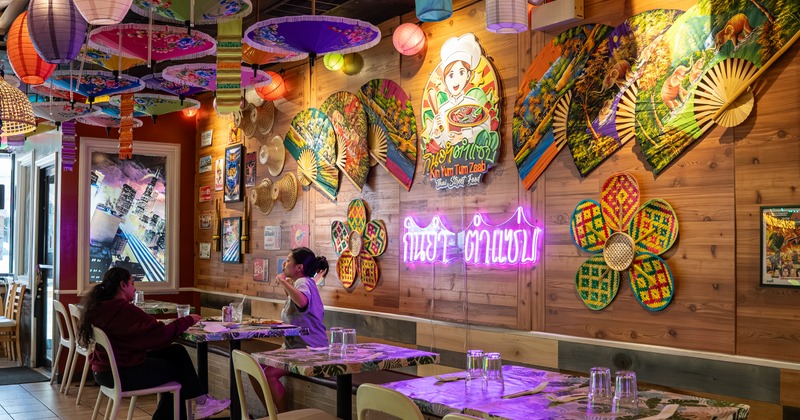 Interior, dining area with neon signs