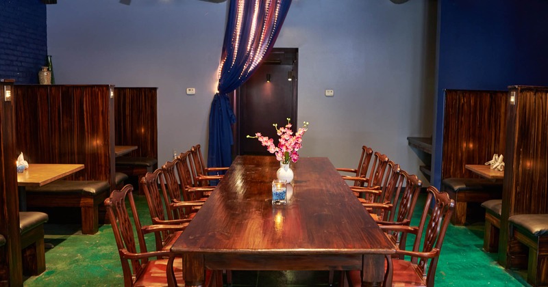Interior, long table and chairs ready for guests