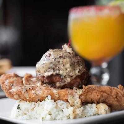 A dish of seafood and rice.