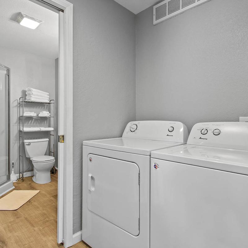 The laundry washing machines.