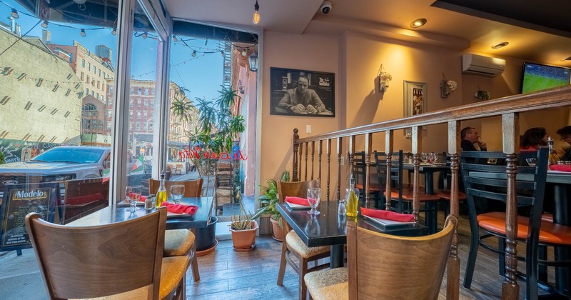 Interior, tables set for guests