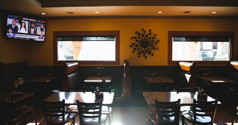 Seating area with TV on the wall