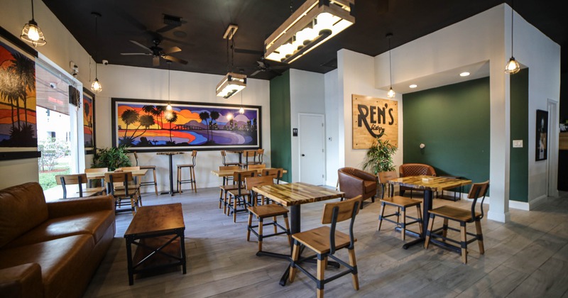 Interior, tables and chairs in seating area