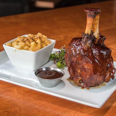 Beer braised BBQ pork shank, with a side of mac and cheese.