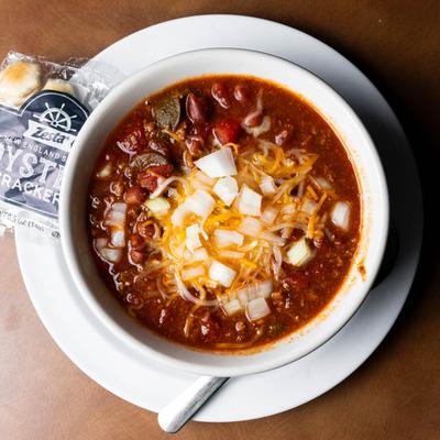 house made beef chili topped with cheese and onions.