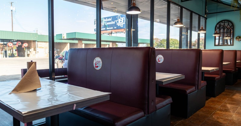 Seating booths by the windows