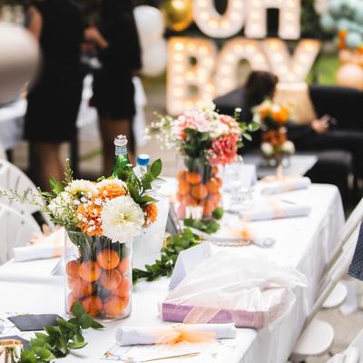 Interior, table setting, tableware and flowers.