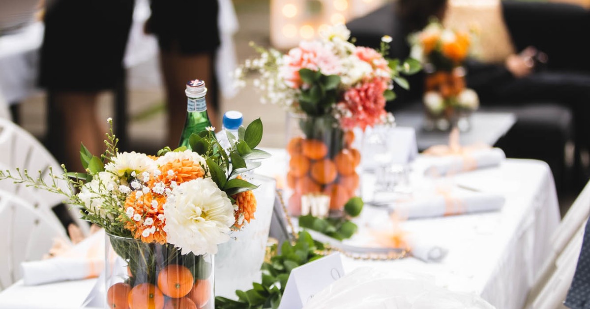 Floral decoration on a set table, close up