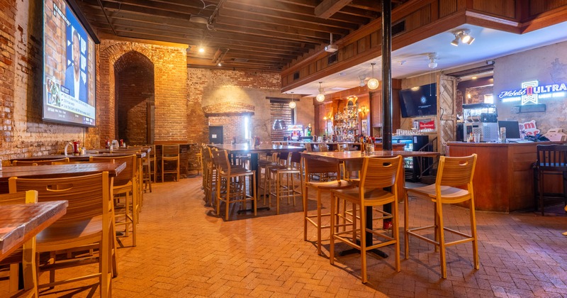 Interior, seating area with a bar in the back