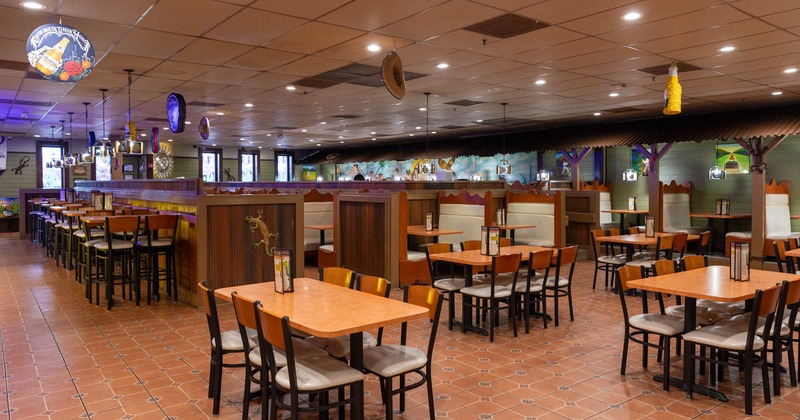 Interior, dining area, regular tables for six, separated seating booth area, tile flooring