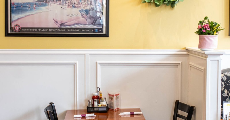 Interior, tables and chairs set for guests