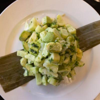 Dinner Salad with cucumber, avocado, onion, cilantro, lime and vinaigrette.