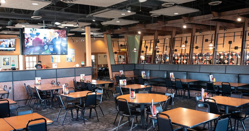 Interior, wide view of dining area, tables and chairs