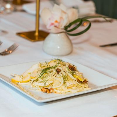 Shaved fennel and pear salad with walnuts and dill.