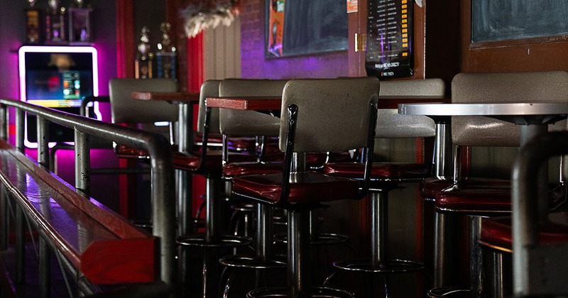 Interior space, tables and chairs close up
