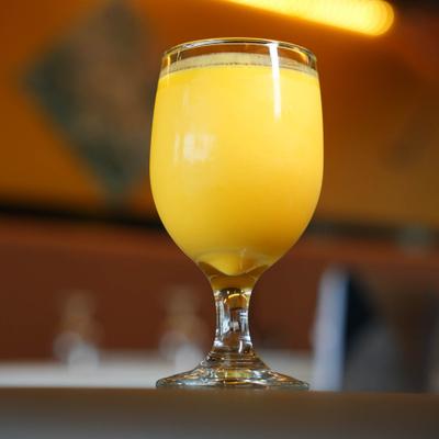 Glass of mango lassi.