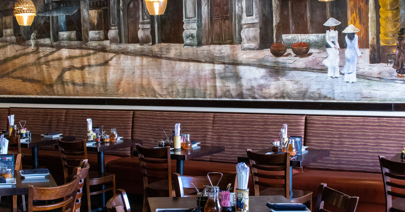 Interior, tables set for customers