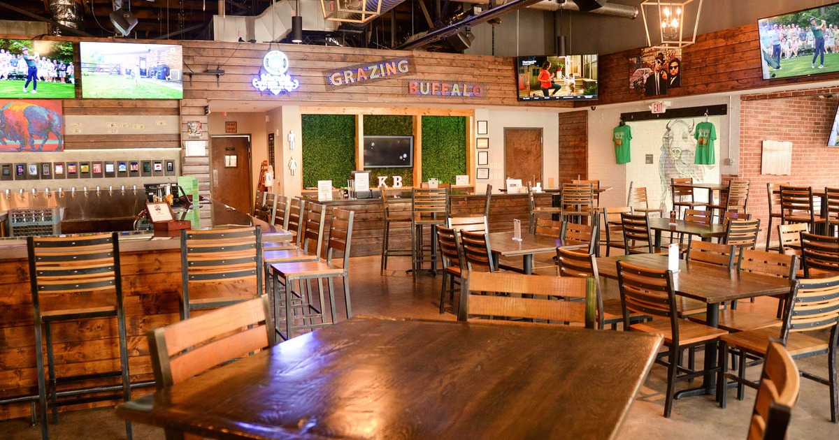 Interior, seating area with bar on the left