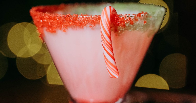 A martini garnished with a candy