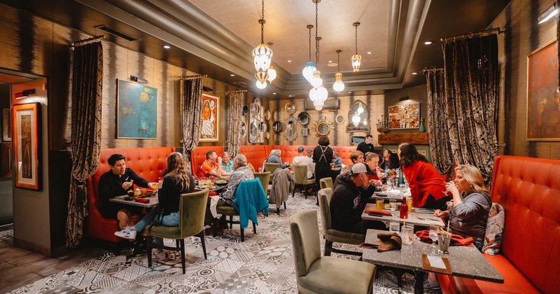 Inside a dining area with guests dining