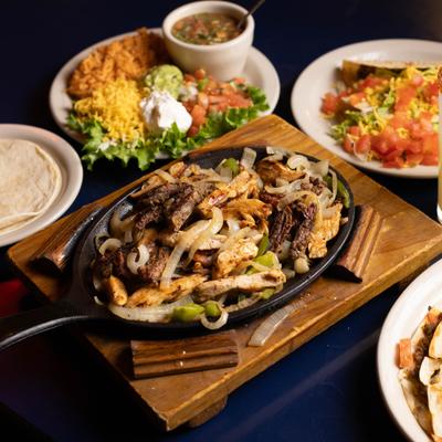 Fajitas with side dishes.