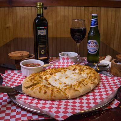 Cheese bread served with marinara sauce, beer, red wine, and balsamic vinegar.