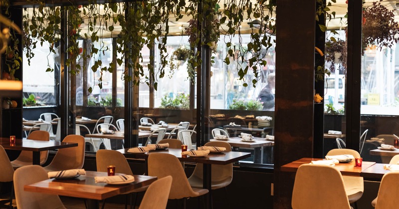 Restaurant dining area, fully set tables