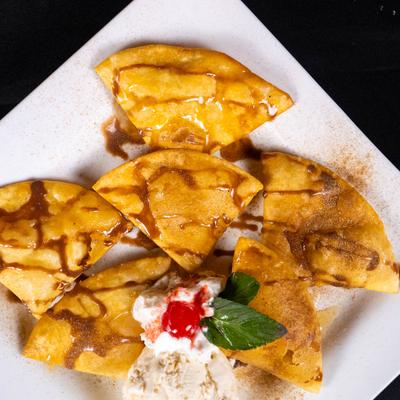 Sopapilla pastry with toppings.