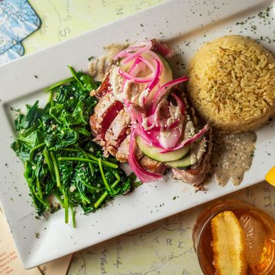 Ahi tuna with spinach and rice, top view.