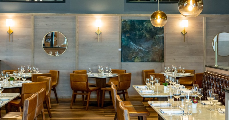 Set dining tables waiting for guests